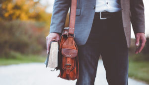 man holding bible